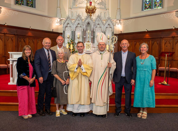Rev. Darren Wallace LC and Bishop Fintan with Wallace Family members. (Photo: John Allen Photography)