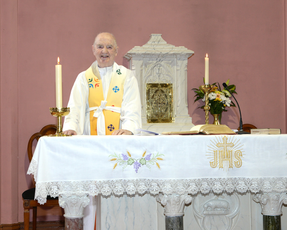 Fr. Tim O'Sullivan at the altar for his Platinum Jubilee of Ordination Mass. (Pic Peter Scanlan)