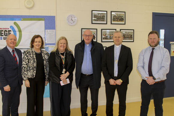 Bishop with school staff
