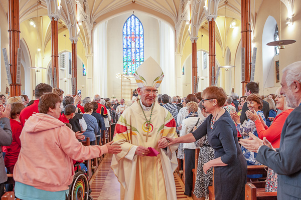 At the Episcopal Ordination of Fr. Fintan Gavin as Bishop of the Diocese of Cork & Ross at the Cathedral of St. Mary and St. Anne in Cork. Bishop John Buckley, now retiring, being greeted by guests as he exits the cathedral after the ordination. Pic: Brian Lougheed