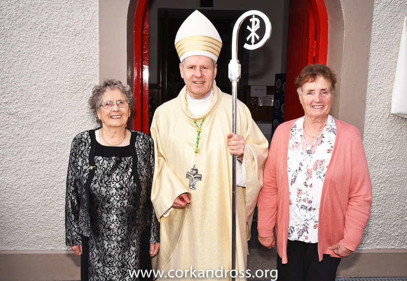 Kitty Butler and Maura Holland with Bishop Fintan at Ballygarvan Church for its bi-centennary.