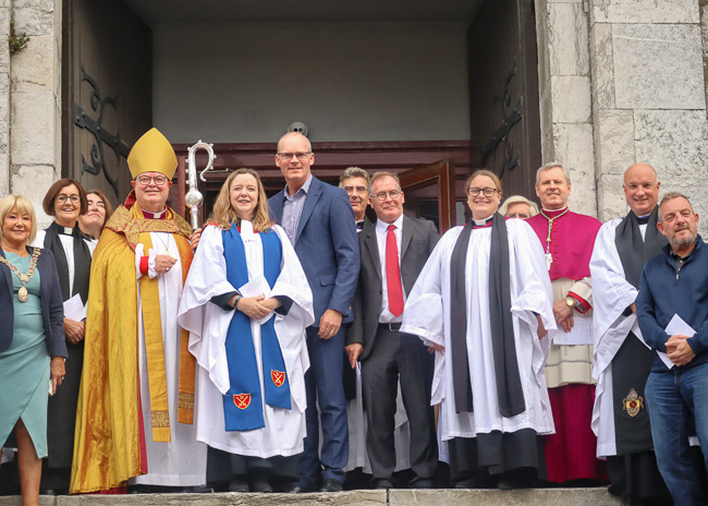 Clergy and guests outside Saint Anne’s Church, Shandon, after the service