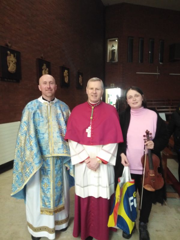 Fr. Roman Biletskyy, Bishop Fintan and Veronika Biletska (violinist)