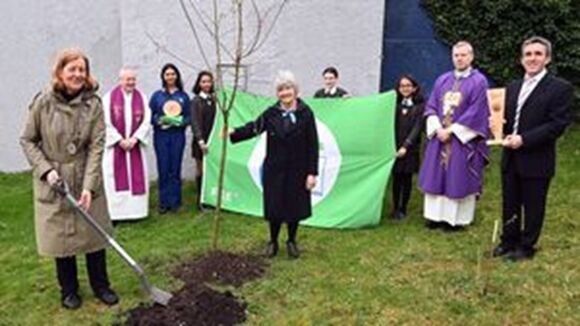 Deputy Lord Mayor Councillor Colette Finn planting a crab apple tree