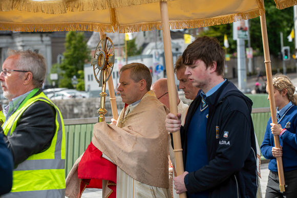 Bishop Fintan Gavin carries the Blessed Sacrament in the Procession