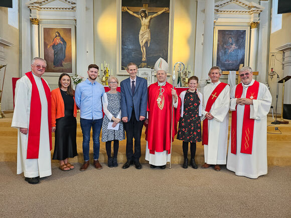 Paul Ryan with family and clergy at Kinsale Church
