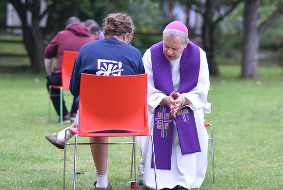 Bishop Fintan hearting Confessions at the Youth 2000 Retreat