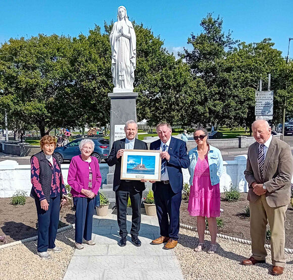 John Deasy, president of the Skibbereen branch of the Vocations Society of St Joseph's, making a presentation to Bishop Fintan.