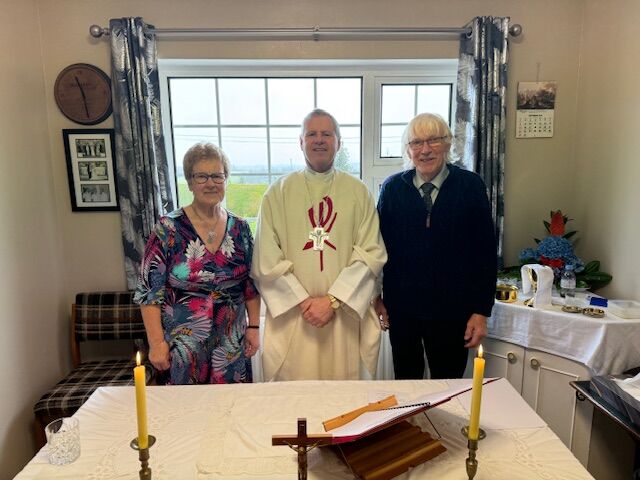 Hosts Mossie Breda Buckley with Bishop Fintan