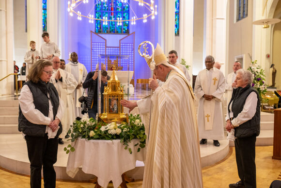 Bishop Fintan Gavin prays at the relics of St. Bernadette at the Cathedral of St. Mary and St. Anne, Cork (Pic Brian Lougheed)