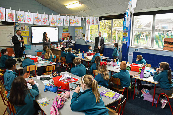 Bishop Fintan chats with a class at Holy Weel school in Carrigaline.