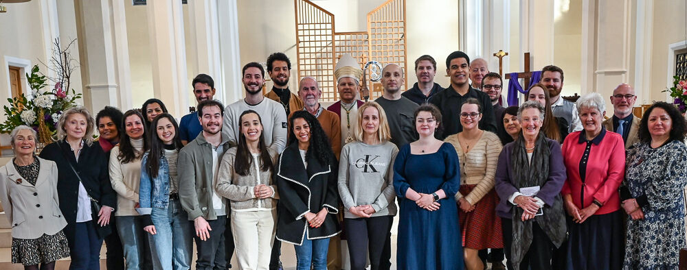 The Elect and candidates, with their sponsors and RCIA groups, with Bishop Fintan