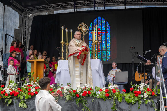 Bishop Fintan Gavin imparts Benediction of Blessed Sacrament on a specially erected pplatform on the Grand Parade.