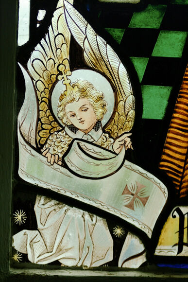 Detail from a stained glass window in Skibbereen's St. Patrick's Cathedral Detail from a stained glass window in Skibbereen's St. Patrick's Cathedral