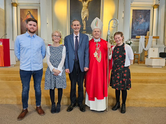 Paul Ryan, his wife Bríd,  their daughter Anne and son Tomás, with Bishop Fintan Gavin in May 2024. (Pic. Mariana Wirsam)