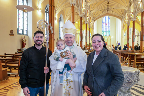 Bishop Fintan Gavin pictured with 4-month-old  Bento and his parents, members of the Brazilian Catholic Community in Cork.Pic: Brian Lougheed