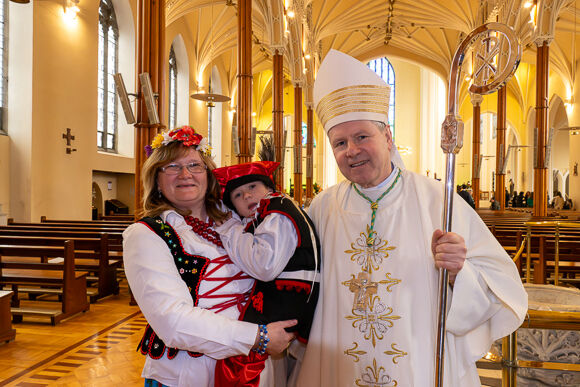 Bishop Fintan Gavin pictured with Agnes Slotwinska and her five-year-old son Patryk from Krakov in Poland.Pic: Brian Lougheed