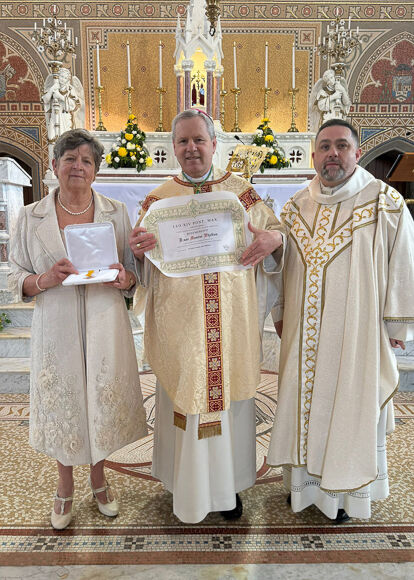 Retired sacristan Maura Whelton with Bishop Fintan Gavin and Fr. Fergus Ryan OP CC