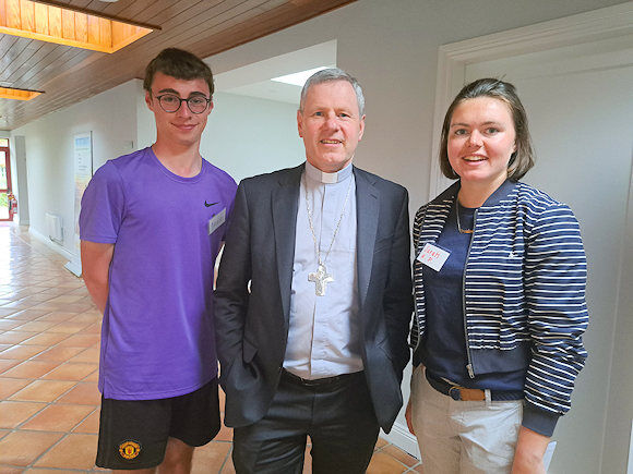 Bishop Fintan Gavin with WYD pilgrims Dean O'Brien and Sarah Ryan-Purcell.