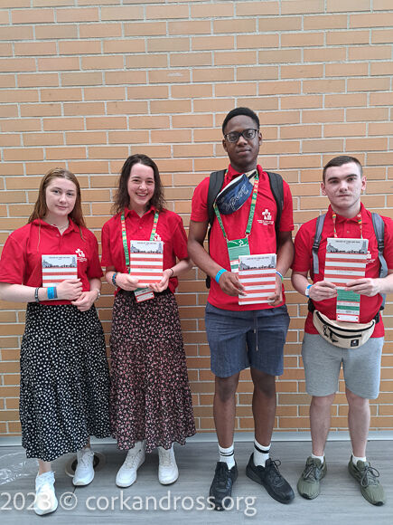 Julianne Collins, Sarah O'Driscoll, Desmond Oluwagbemileke Alapini and Roger Power showcasing their Cork and Ross polo shirts and journals.